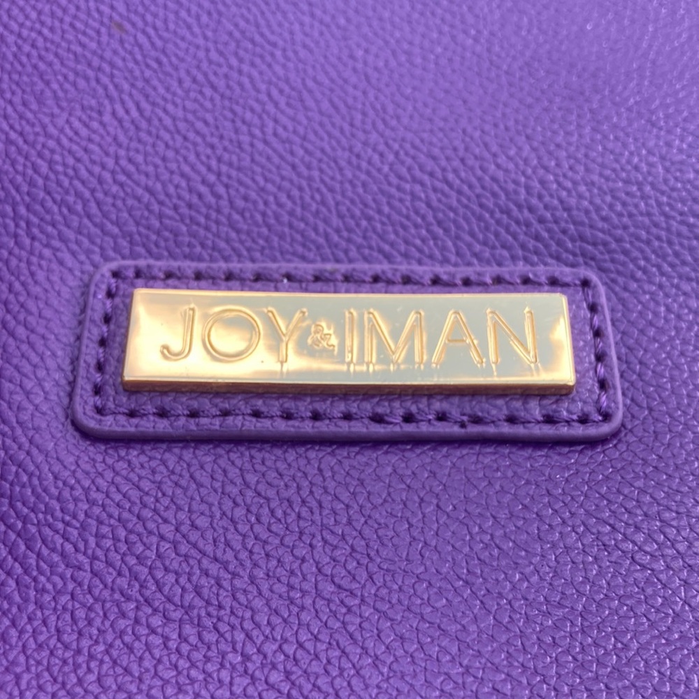 Purple leather purse One compartment and golden zipper